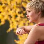 Woman practicing Tai Chi outdoors, clinically proven Tai Chi benefits for blood pressure and balance