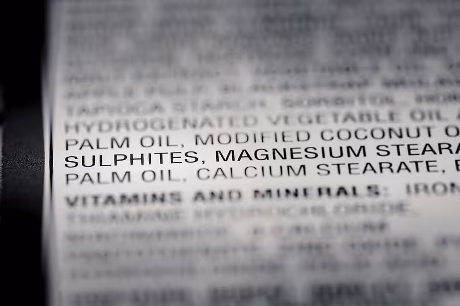 Ingredient label on packaged food showing citric acid and ascorbic acid food preservatives linked to blood pressure risk
